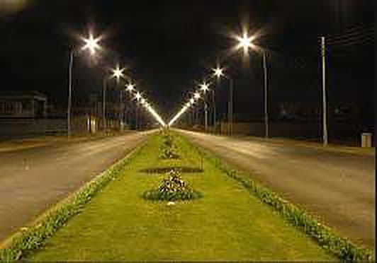 Street lights illuminating a boulevard at night